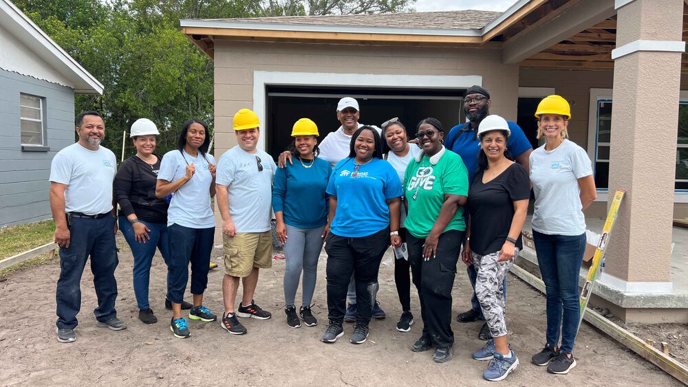 A team from the St. Petersburg Housing Authority (SPHA) volunteered their time and efforts on a new Habitat for Humanity home on April 18, 2024.