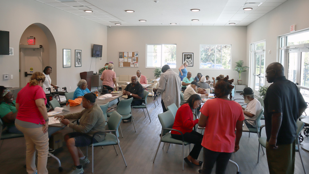 Jordan Park residents and SPHA staff inside The Legacy at Jordan Park.