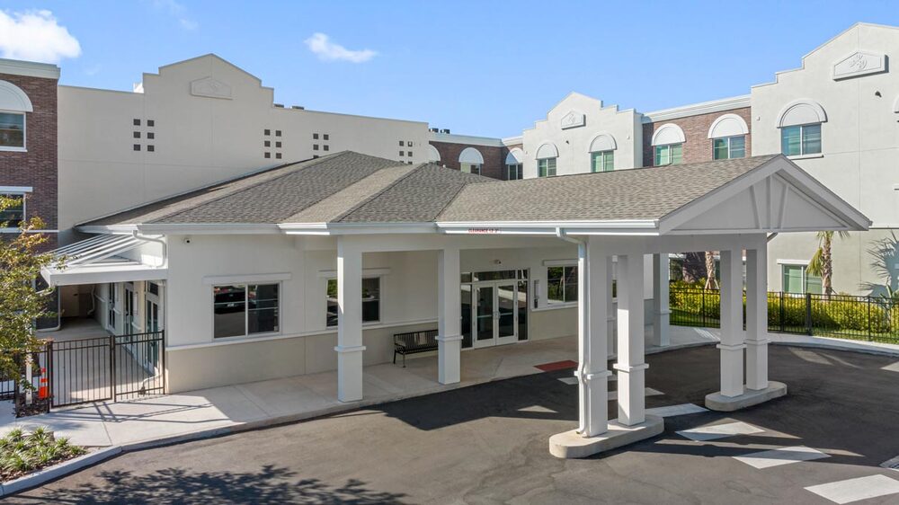 Exterior of The Legacy at Jordan Park senior midrise building in St. Petersburg, Florida.