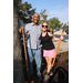 Two people holding shovels at the Jordan Park Community Garden on August 8, 2024.