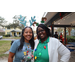 Two women wearing holiday headgear at Very Merry Holiday Party in Jordan Park.