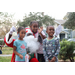 Three children and Santa Claus at Very Merry Holiday Party in Jordan Park.