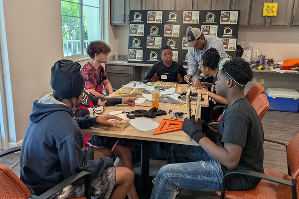 1construction.jpg Group of students seated at Summer Construction Camp 2025.